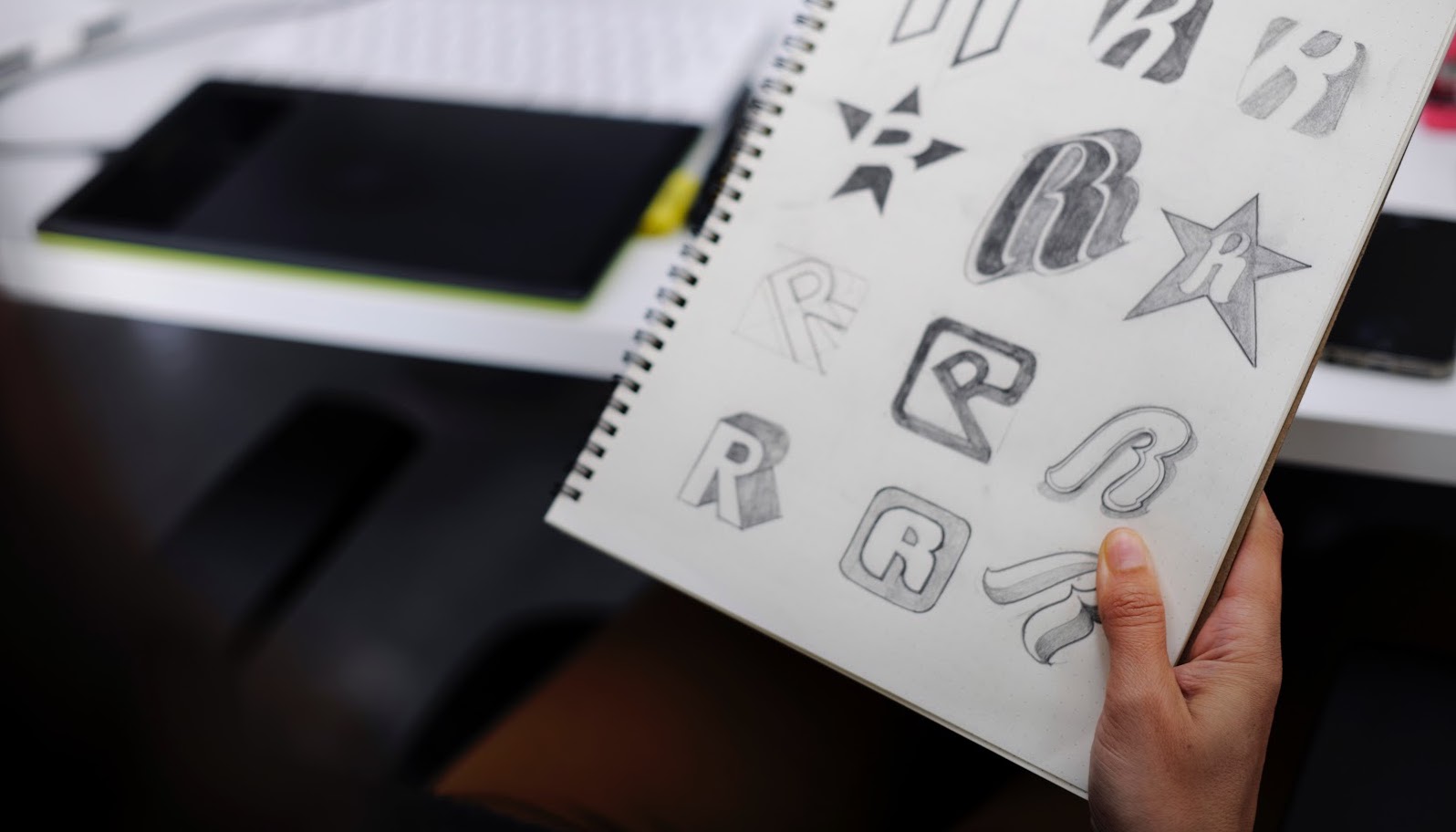 Notebook of logo drawings